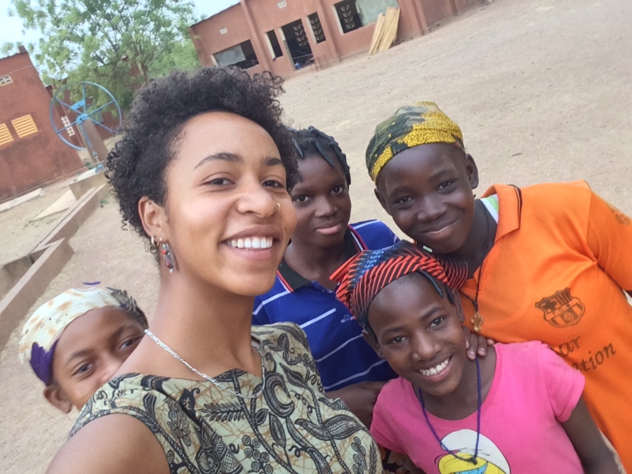 Elena Ruyter '14 with girls in Burkina Faso.
